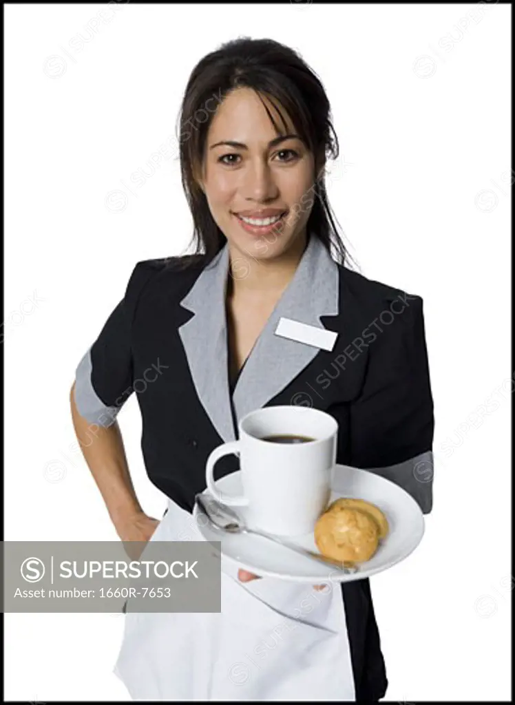 Portrait of a waitress holding a plate with a coffee cup and cookies