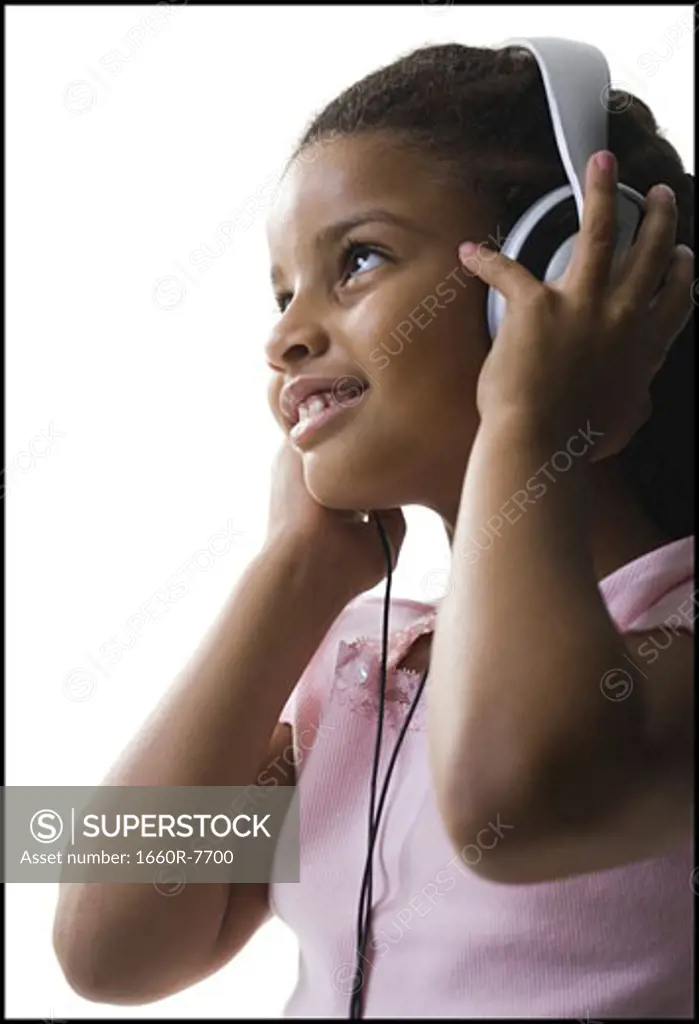 Close-up of a girl listening to music
