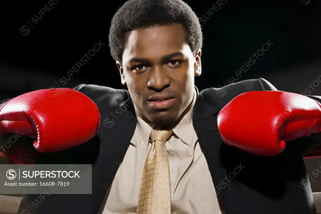 Portrait of a young man in a boxing ring