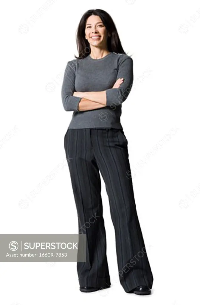Portrait of a mid adult woman standing with her arms crossed