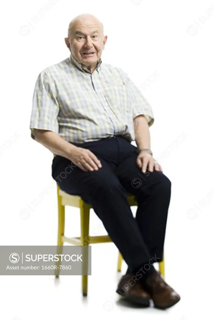 Portrait of a senior man sitting on a chair