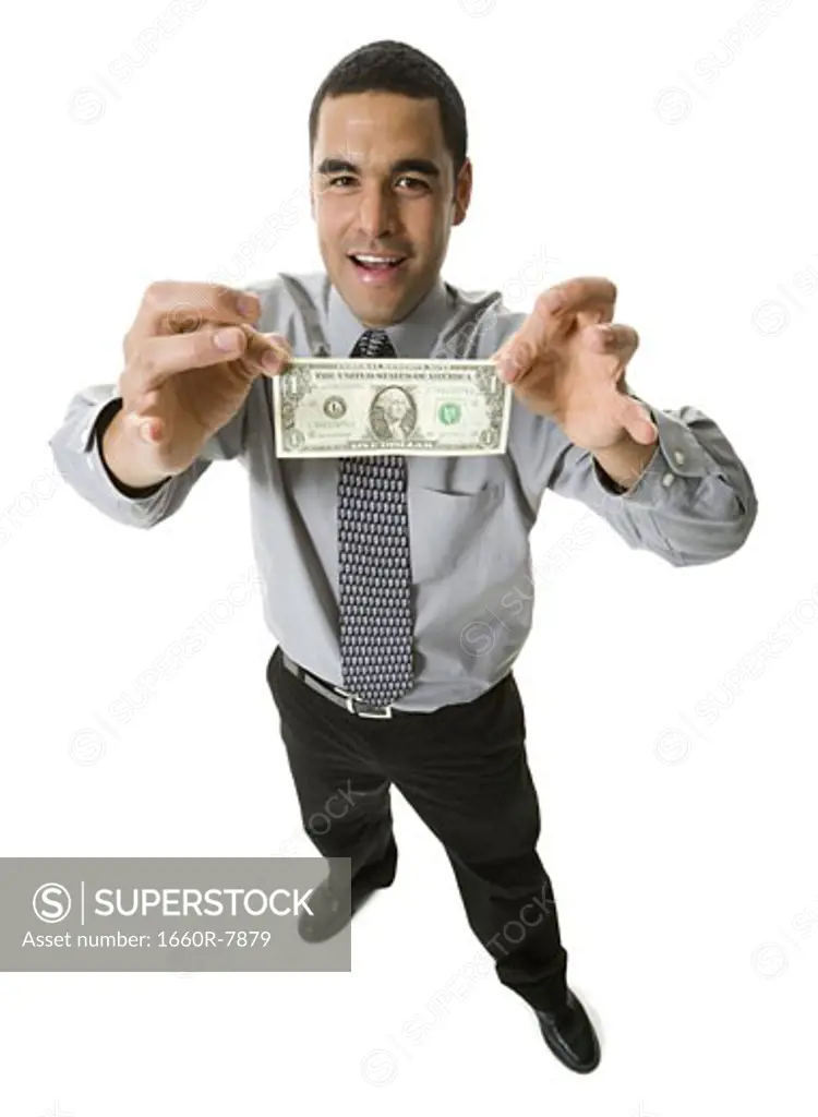 High angle view of a businessman holding Euro dollar note