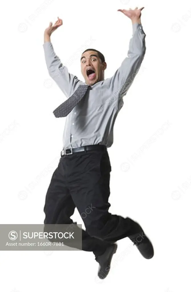 Low angle view of a businessman jumping
