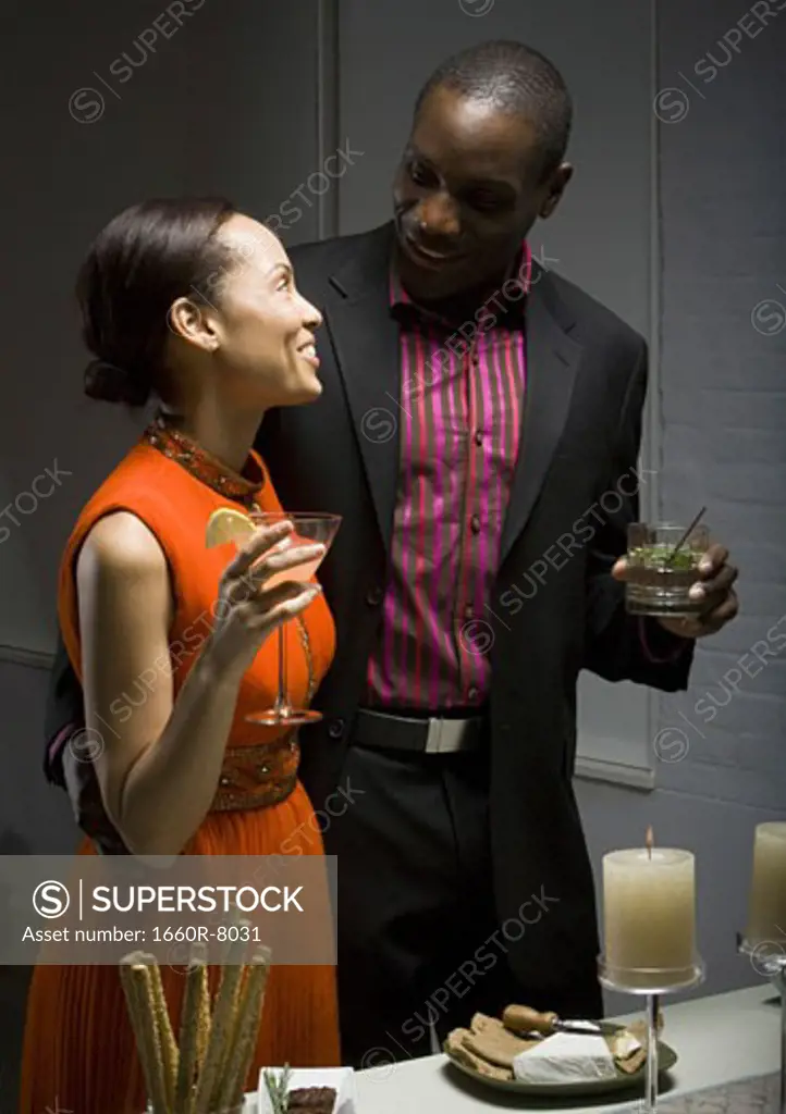 Young couple enjoying a party