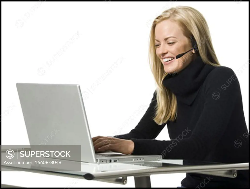 Close-up of a businesswoman working on a laptop