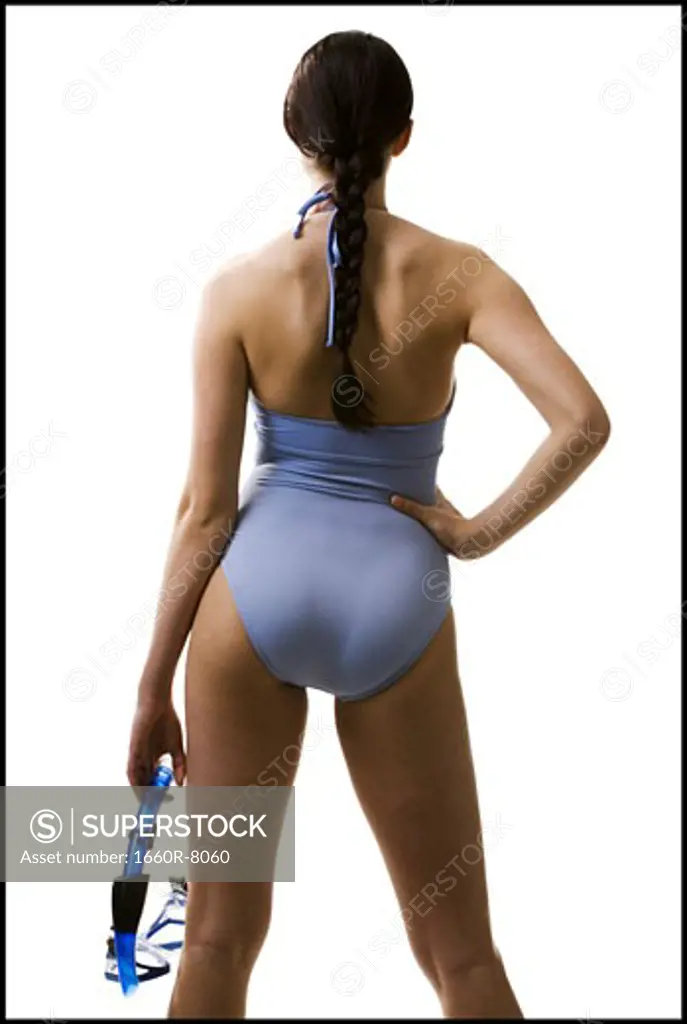 Rear view of a young woman in a swimsuit