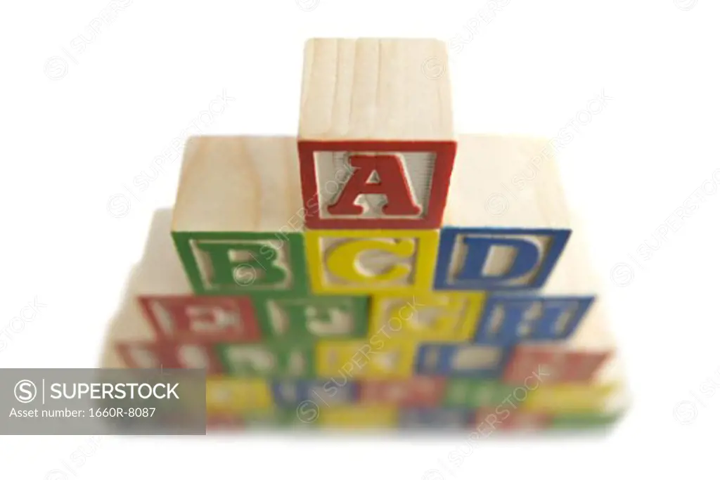 Close-up of a stack of alphabet blocks