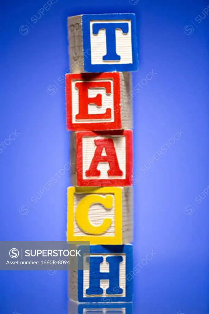 Close-up of a stack of alphabet blocks