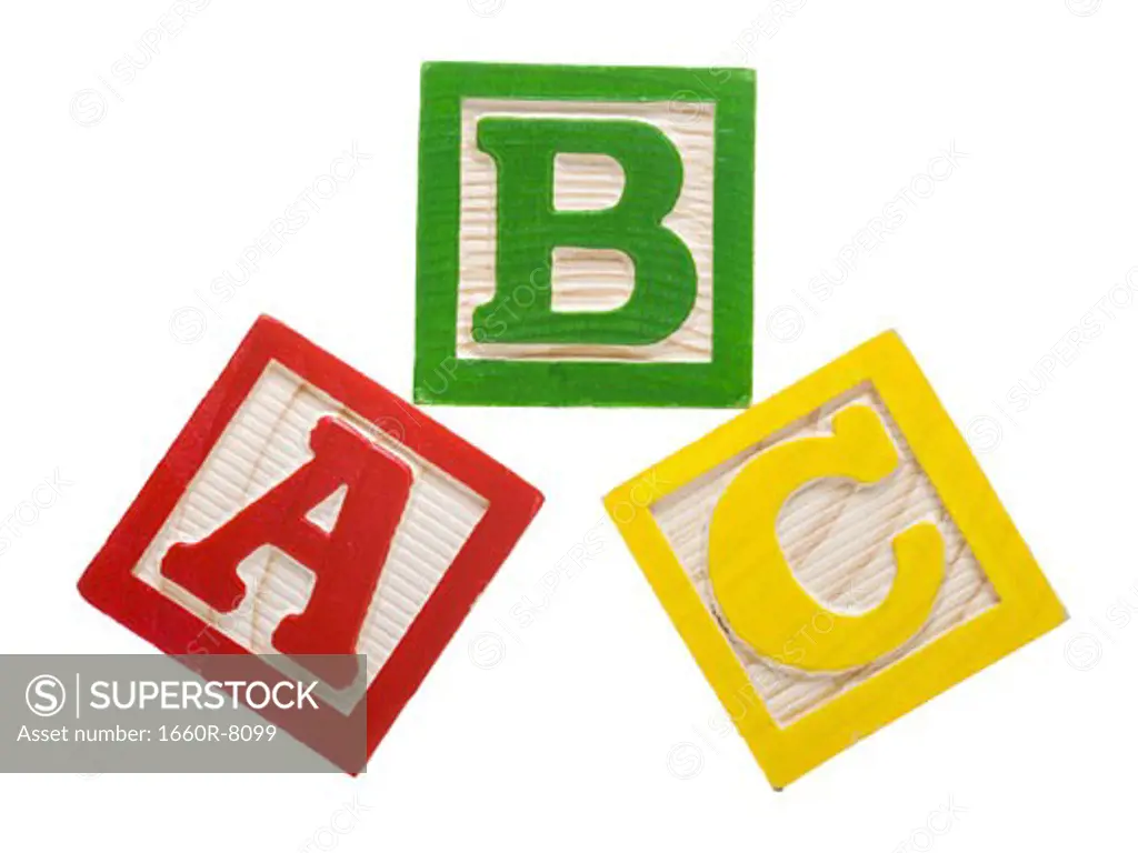 Close-up of three alphabet blocks