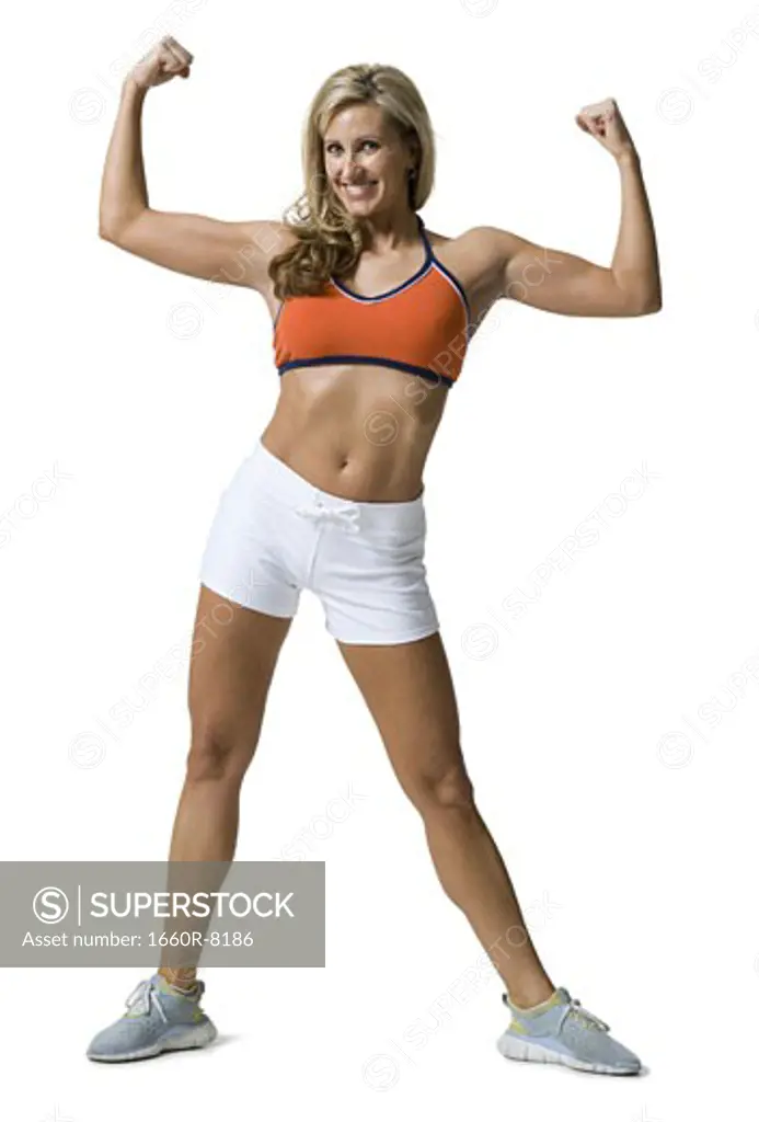 Portrait of a woman flexing her muscles