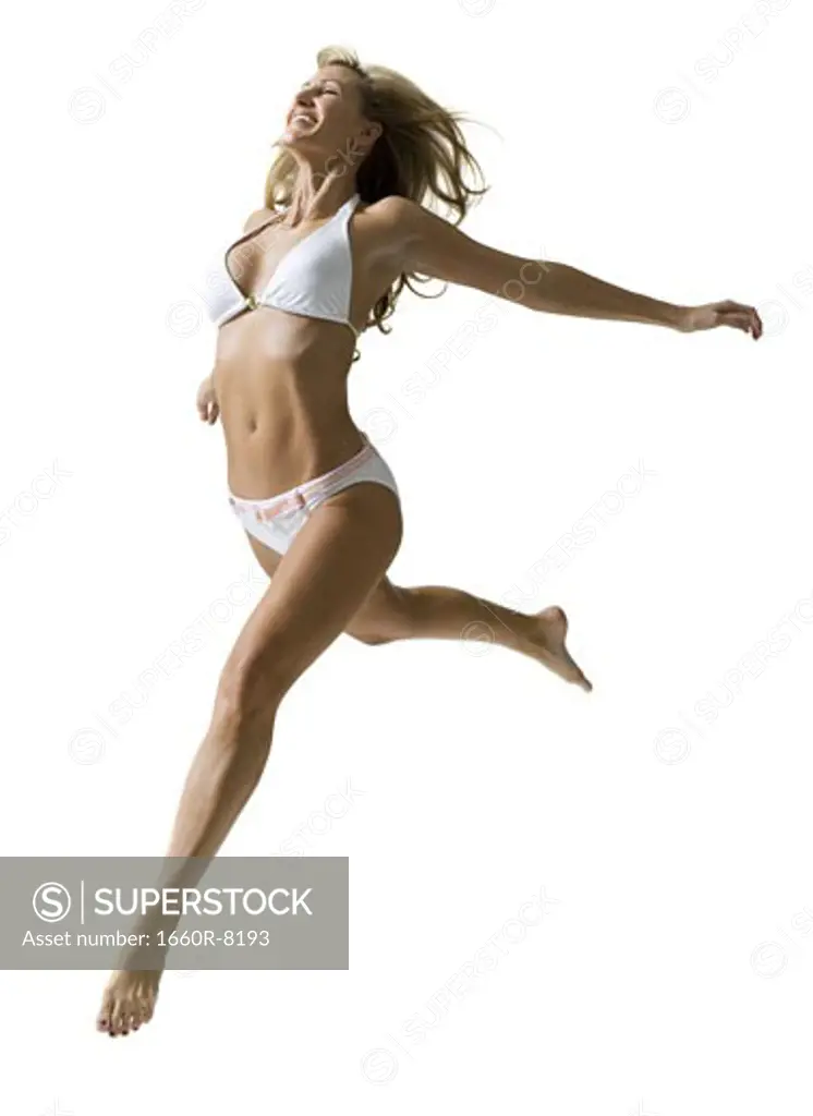 Profile of a woman jumping