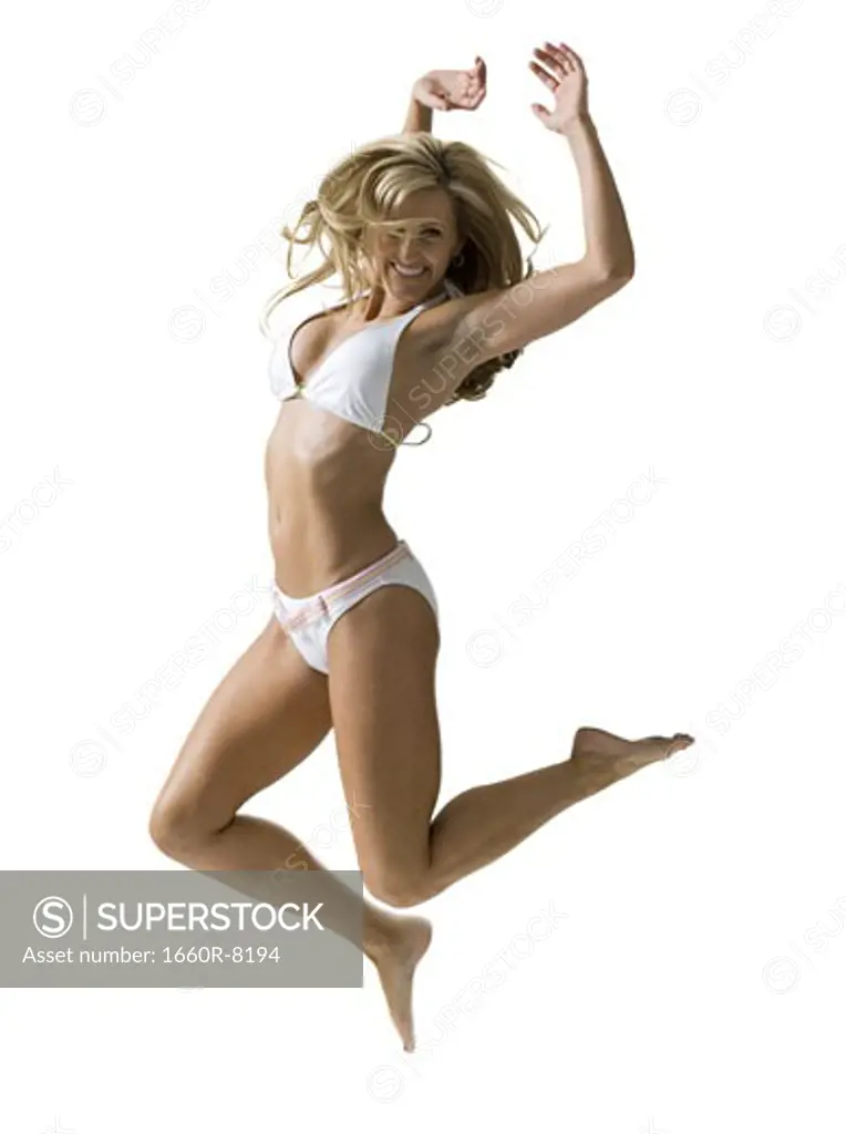 Portrait of a woman jumping