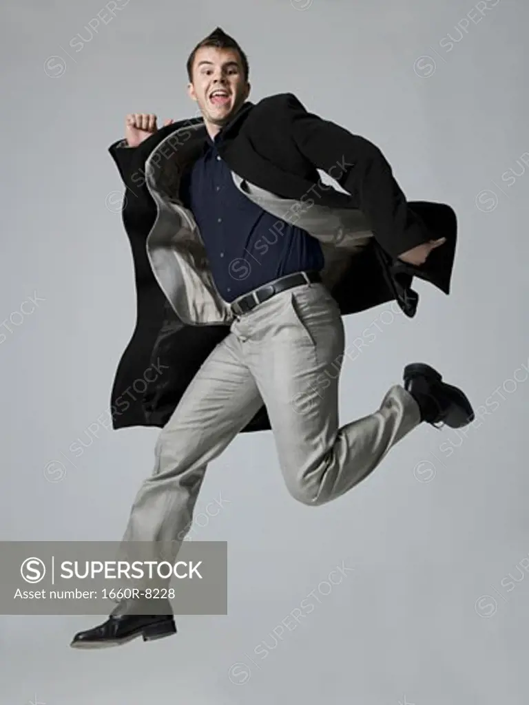 Portrait of a businessman jumping