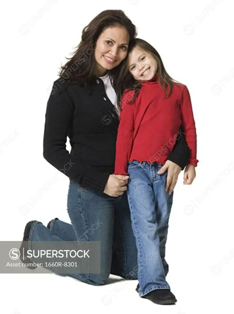 Portrait of a mother hugging her daughter