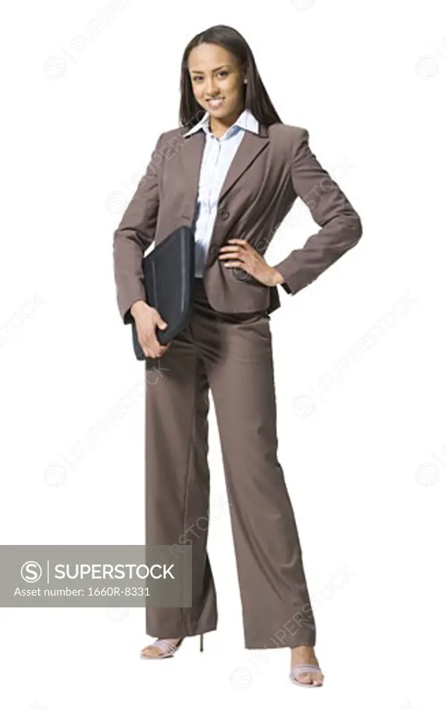 Portrait of a businesswoman holding a laptop