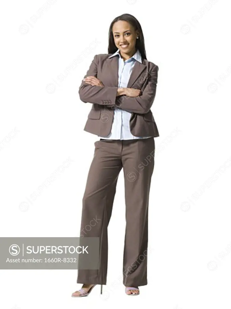 Portrait of a businesswoman standing with arms folded