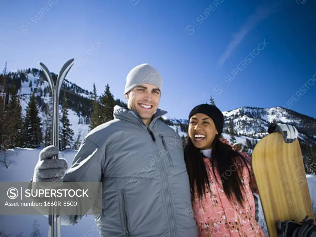 Portrait of a young couple skiing