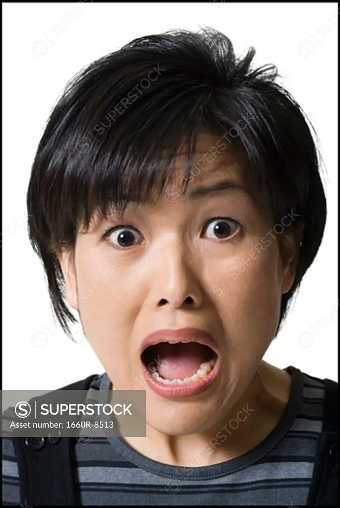Portrait of an adult woman looking shocked