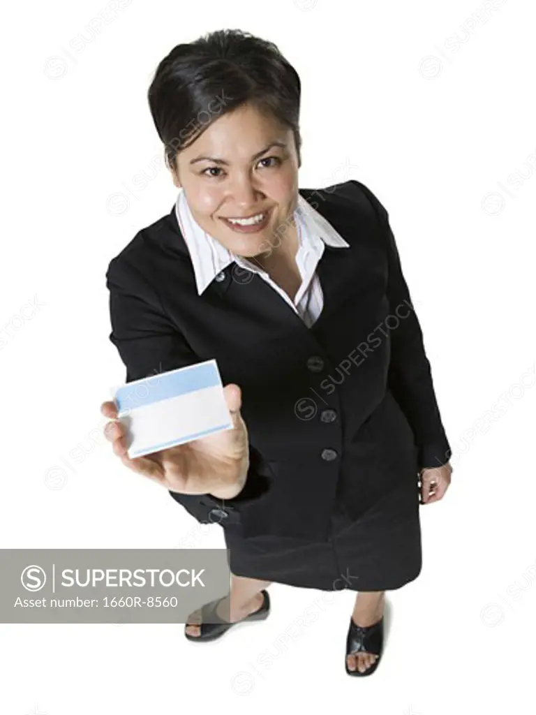 High angle view of a businesswoman holding a nametag