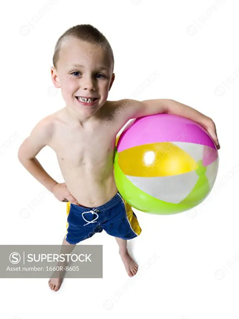 Portrait of a boy holding a ball