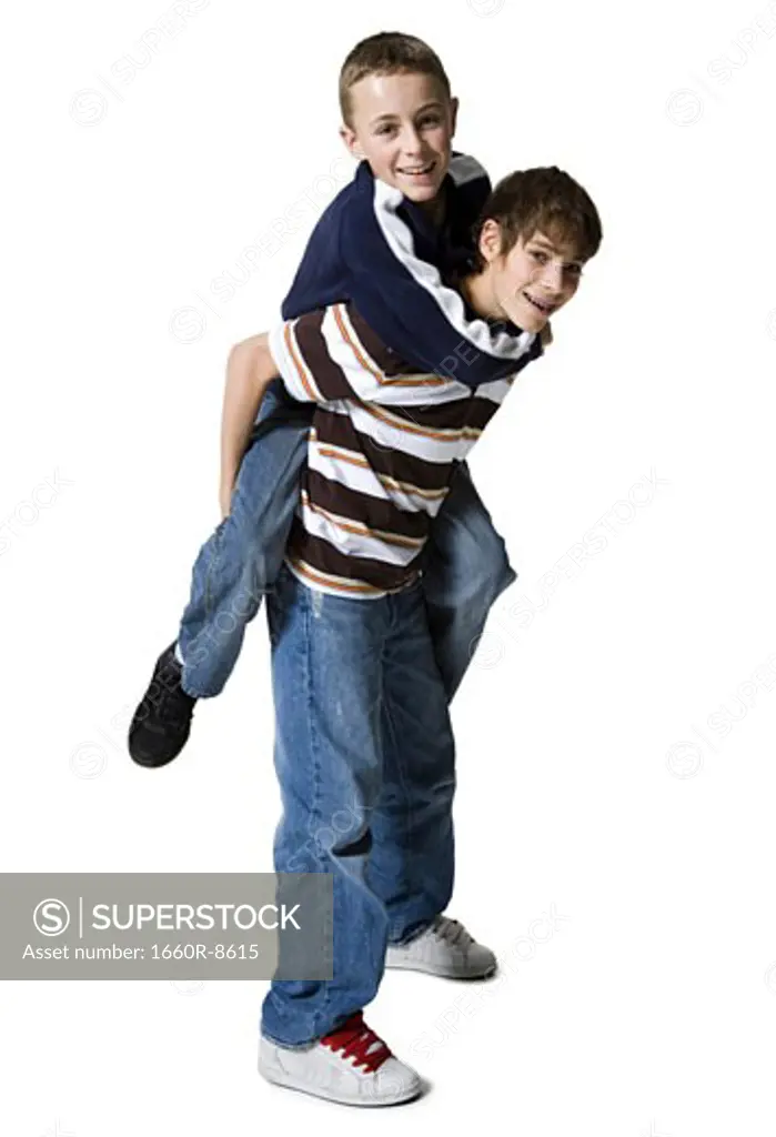 Portrait of a boy riding piggyback on another boy