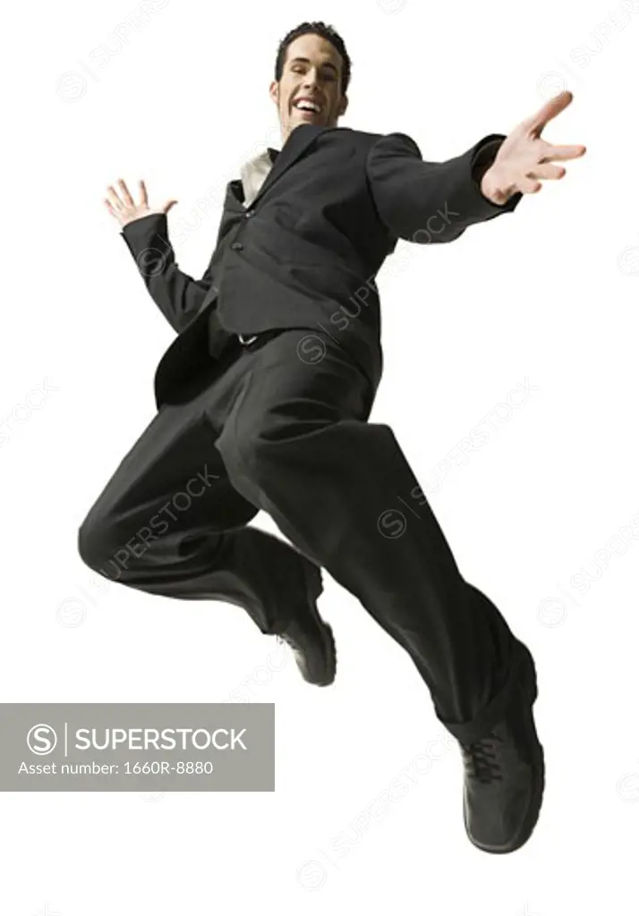 Low angle view of a businessman jumping