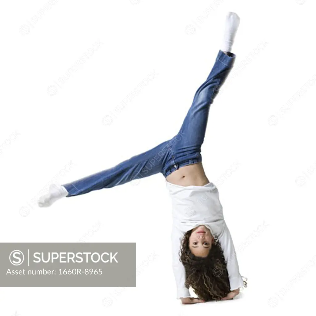 Portrait of a girl doing a cartwheel