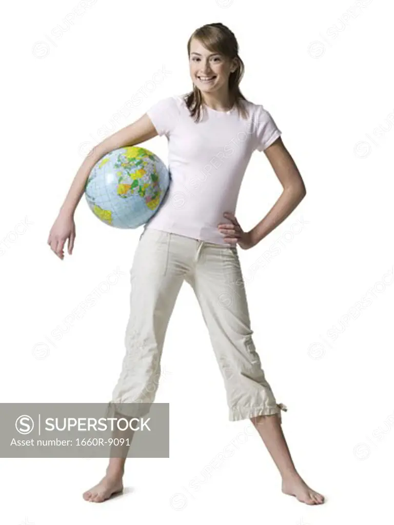 Portrait of a girl carrying a globe