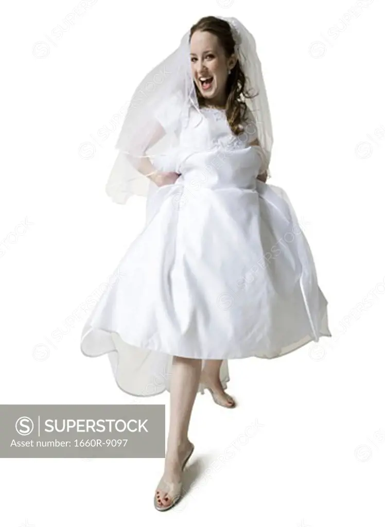 Portrait of a bride showing her sandals