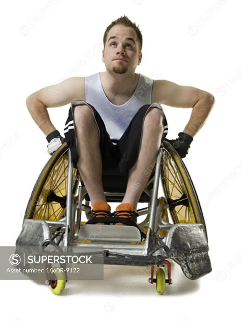 Close-up of a young man sitting in a wheelchair