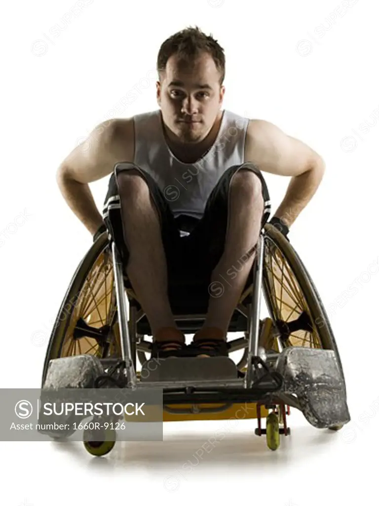 Portrait of a young man sitting in a wheelchair