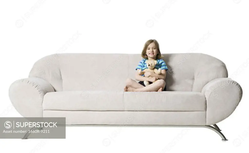 Portrait of a girl sitting on a couch