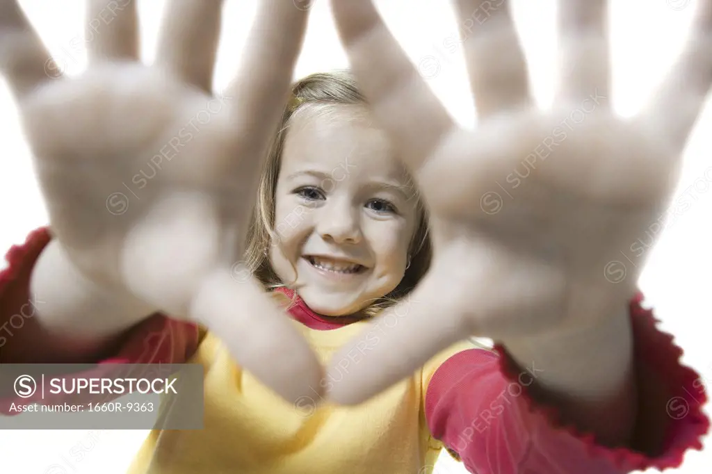 Portrait of a girl showing her hands