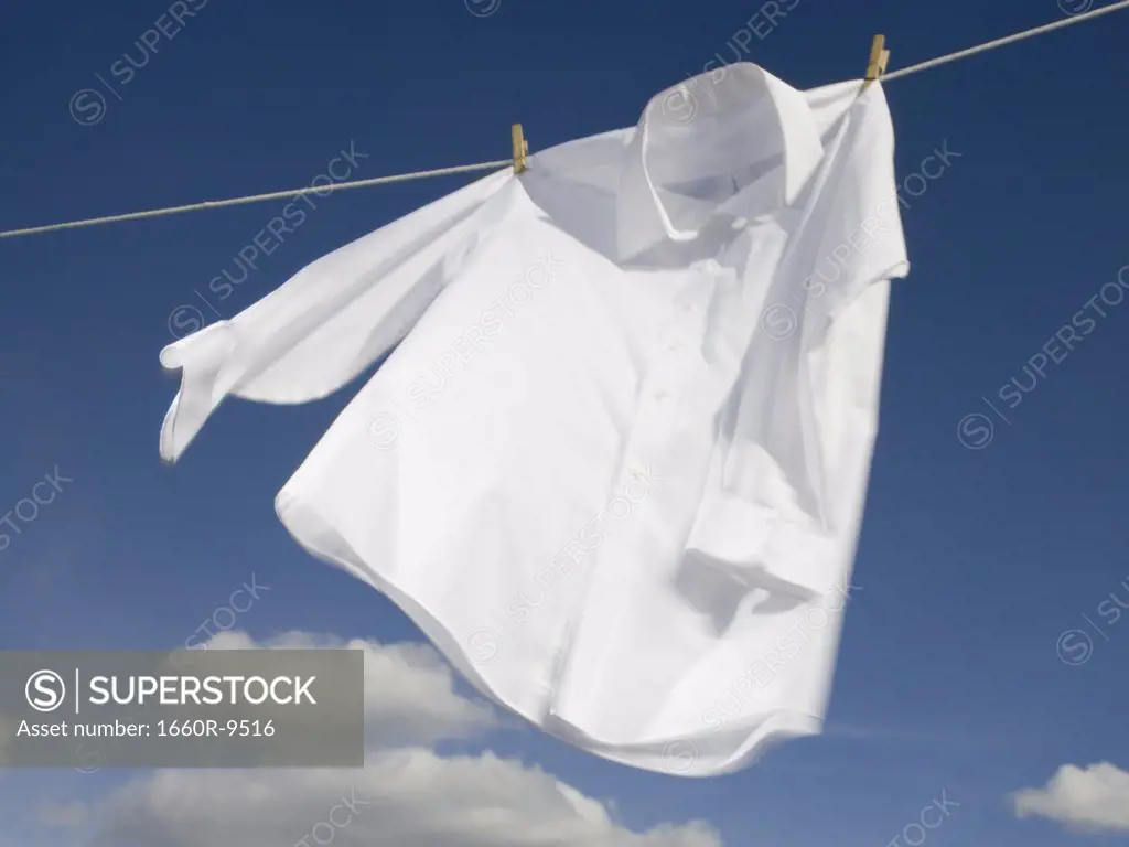 Close-up of a shirt hanging on a clothesline
