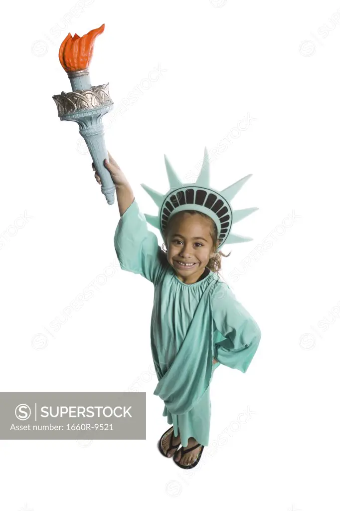 High angle view of a girl dressed as the Statue of Liberty