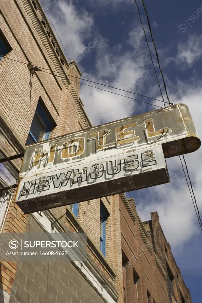 Low angle view of a hotel sign