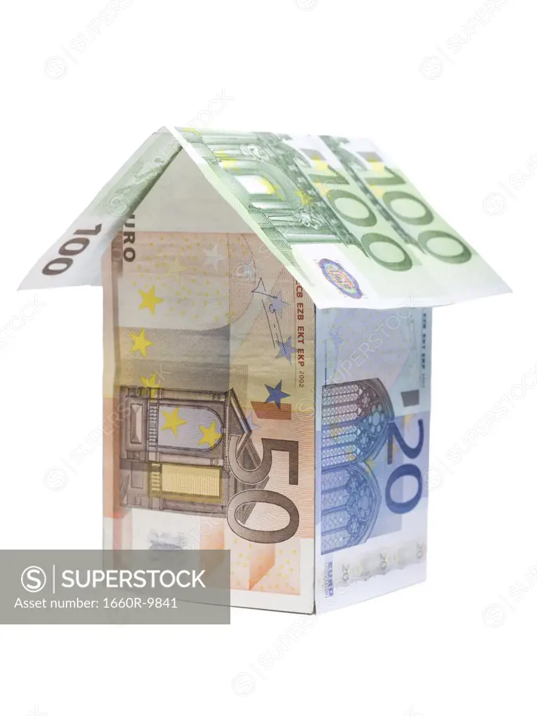 Close-up of a house made of Euro notes