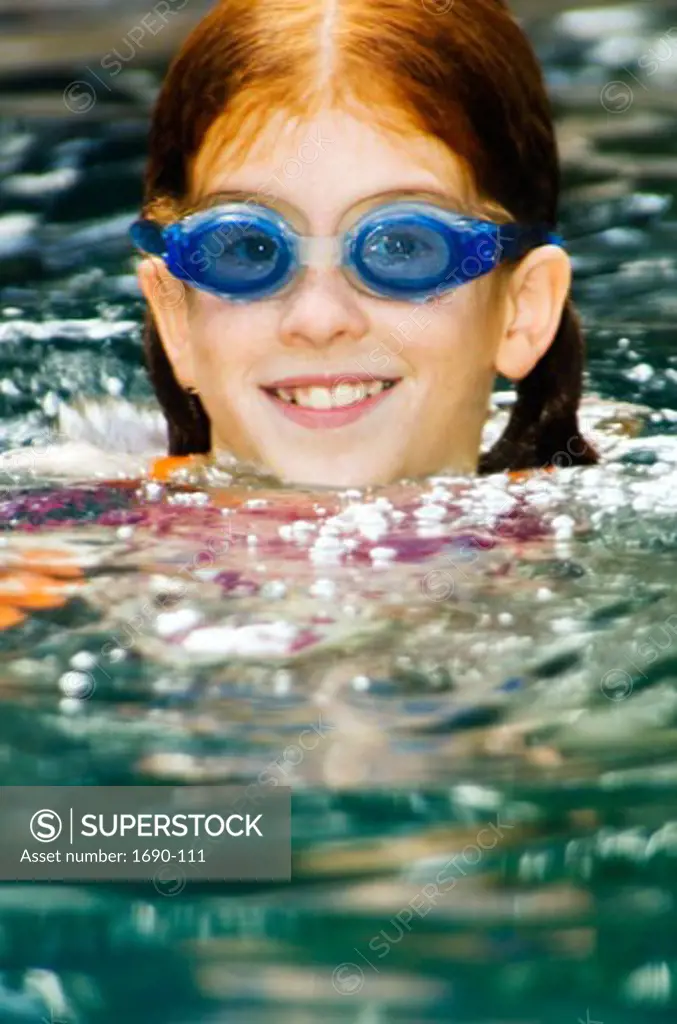 Close-up of a girl in a swimming pool