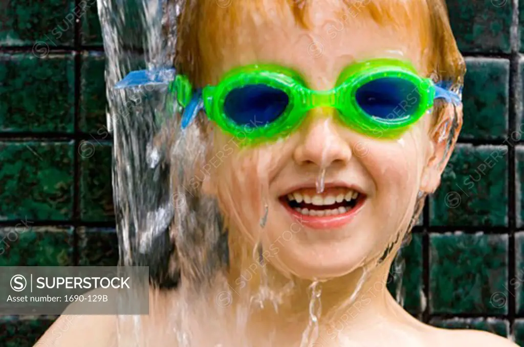 Portrait of a boy wearing swimming goggles