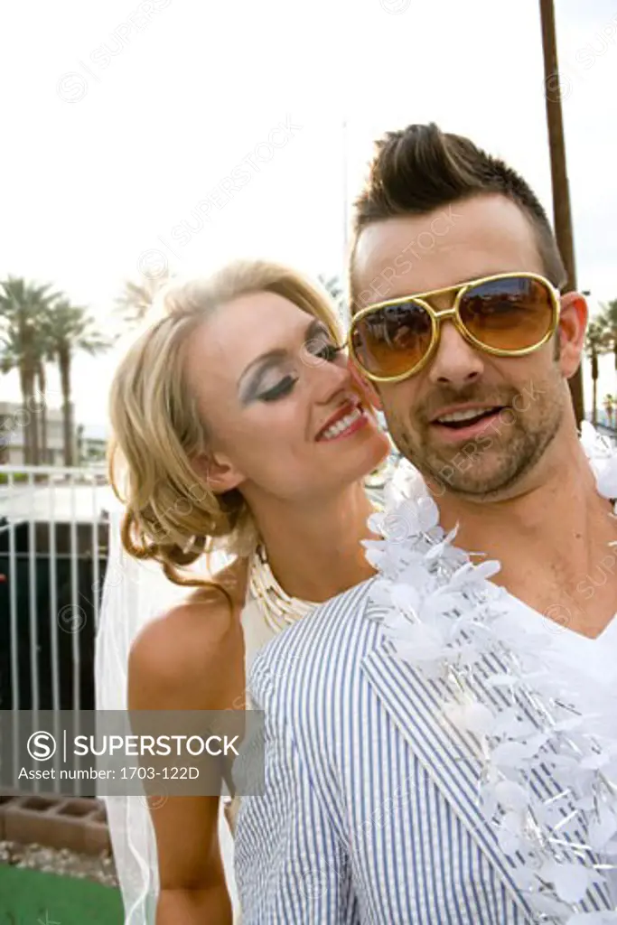 Bride and groom smiling