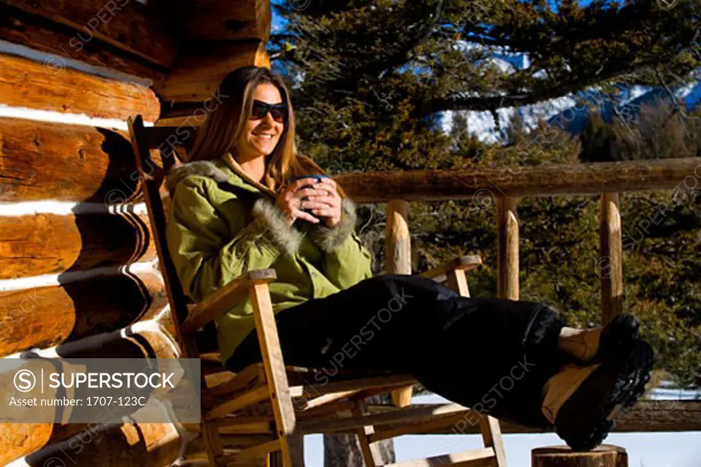 Mid adult woman sitting in a rocking chair
