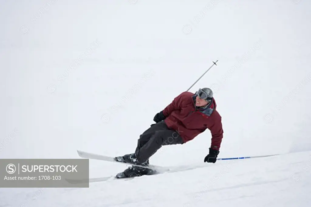 Mid adult man skiing