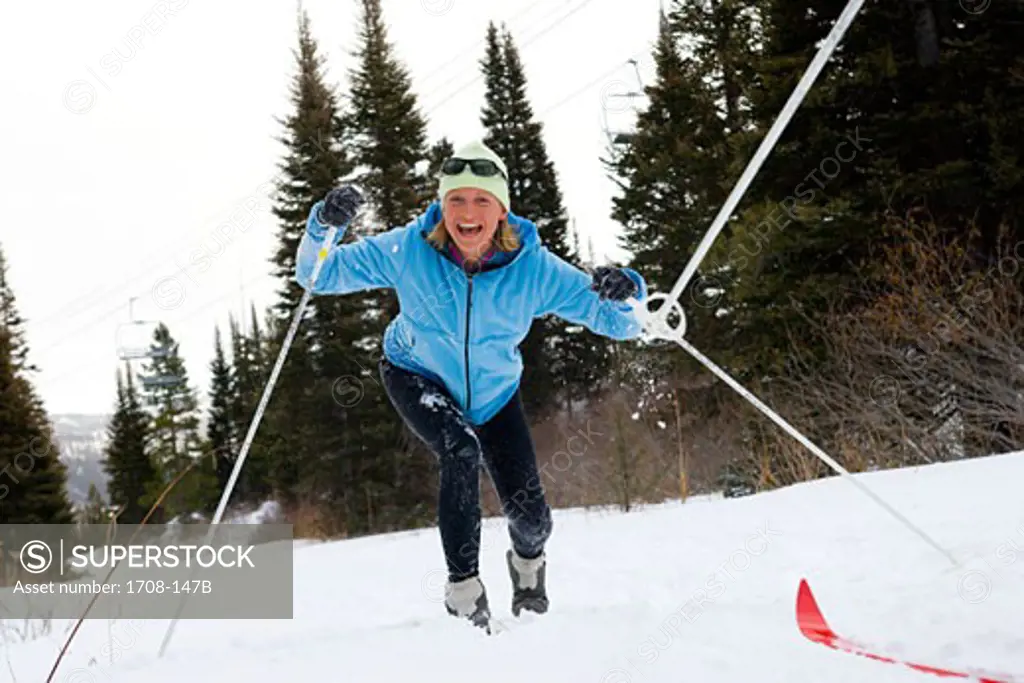 Mid adult woman skiing