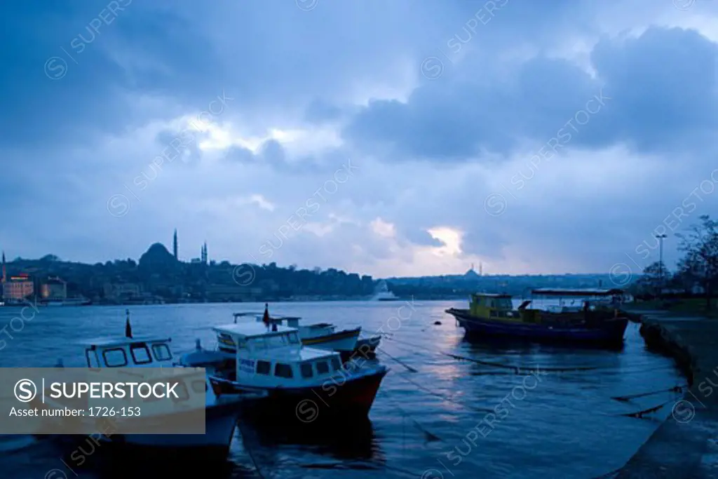 Tourboats in the sea at dusk, Bosphorus, Istanbul, Turkey