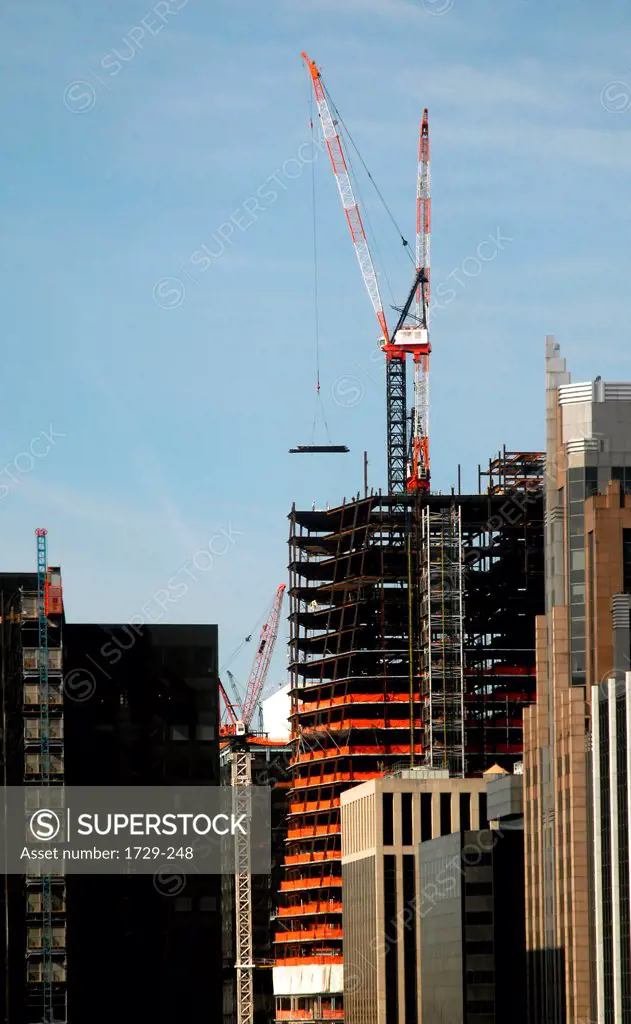Cranes at a construction site, New York City, New York State, USA