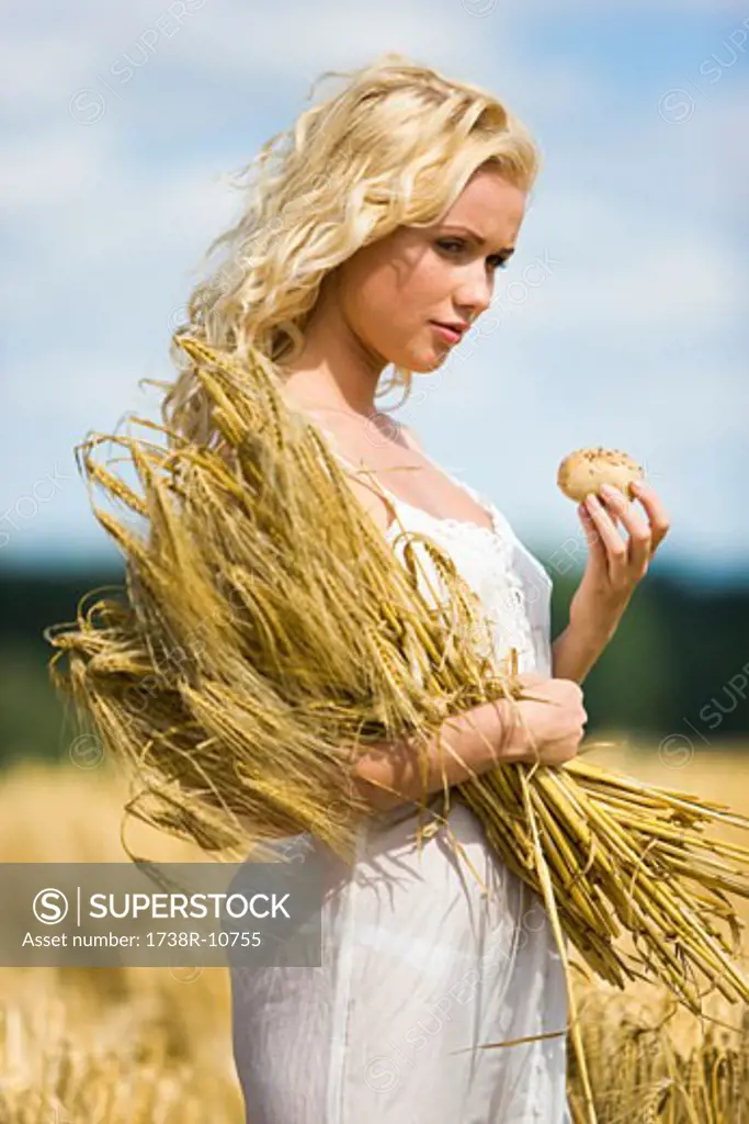 Young woman in a wheat field