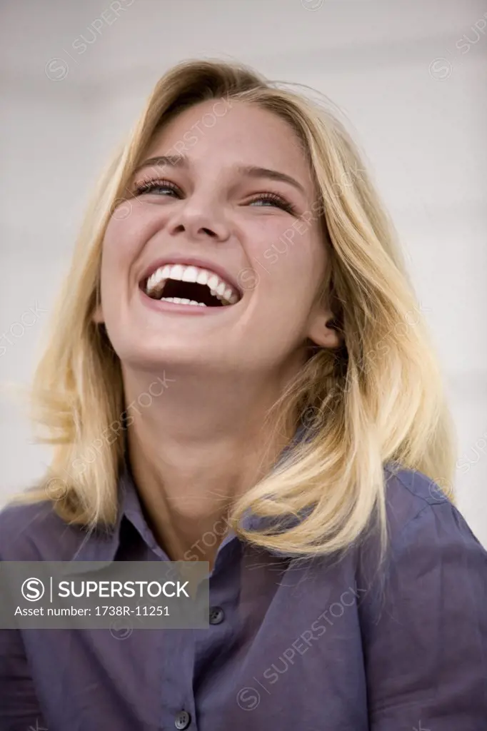 Close-up of a woman laughing