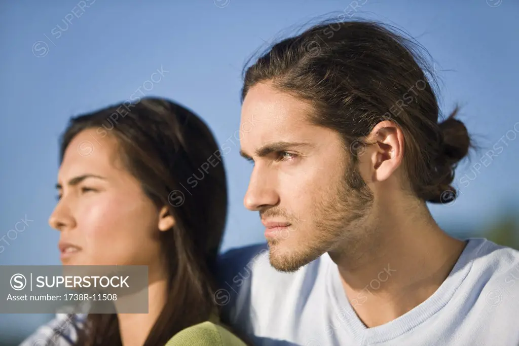 Close-up of a couple looking away