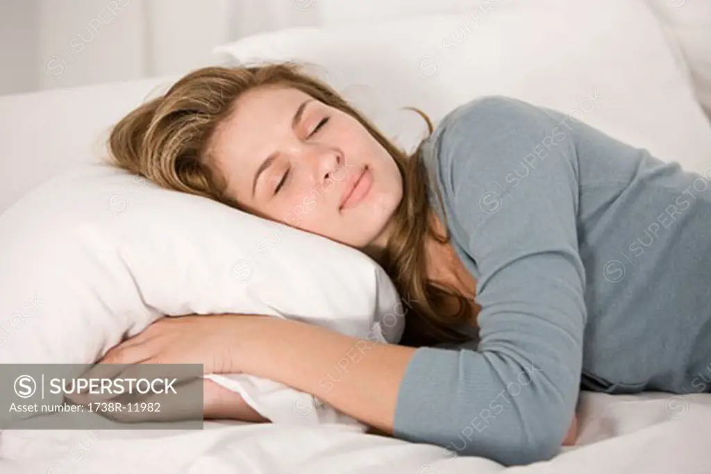 Woman sleeping on the bed