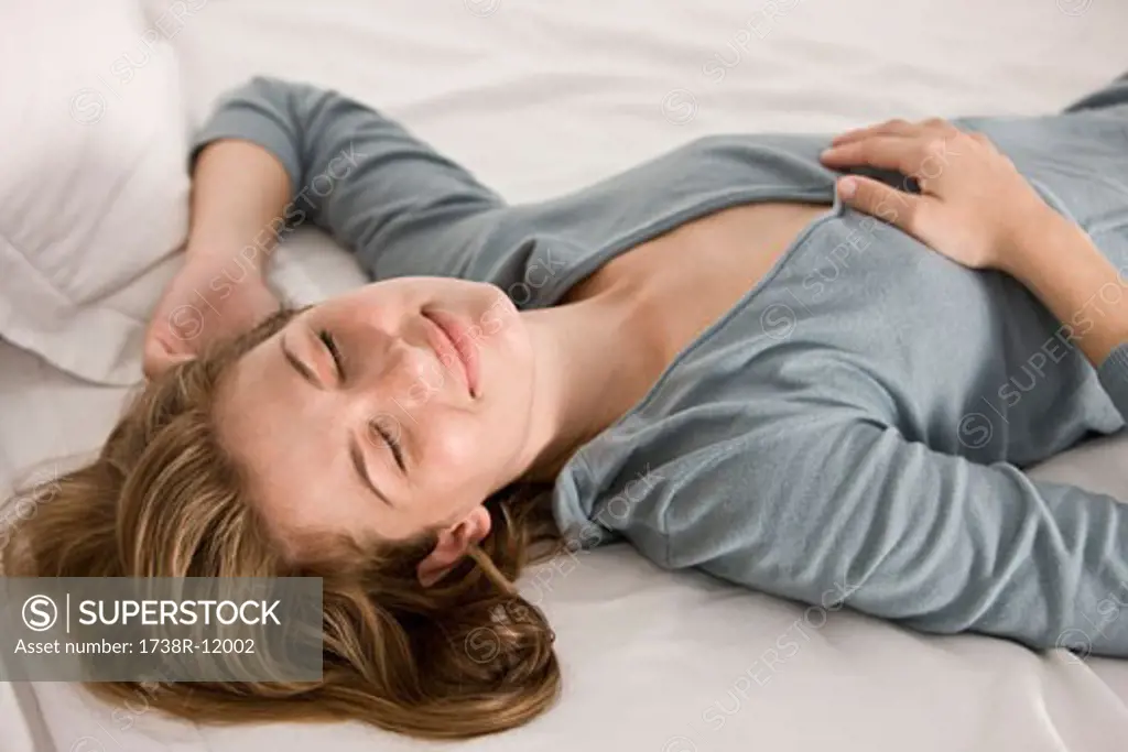 Woman sleeping on the bed
